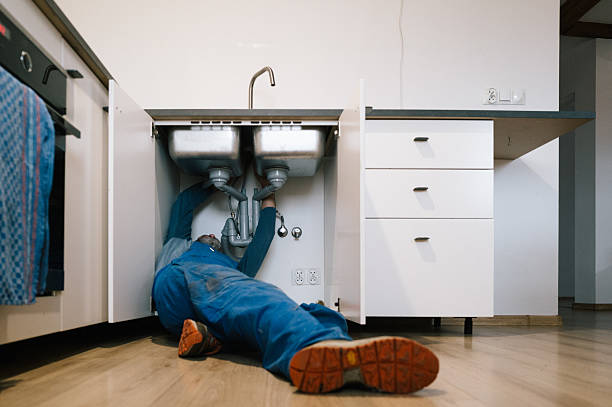 Professional Emergency Plumber technician working in Zullinger, PA